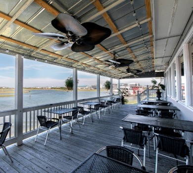 topsail island dining deck | Coastline Realty Vacations