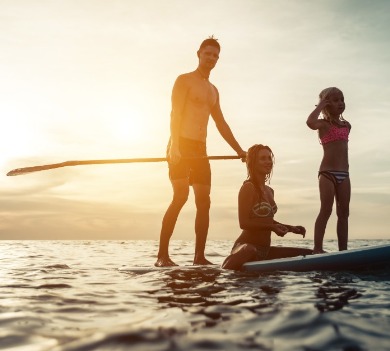 paddleboarding  on topsail beach | Coastline Realty Vacations