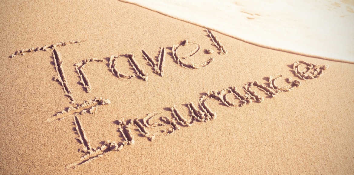 travel insurance written in sand | Coastline Realty Vacations